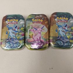 Pokemon Prismatic Evolutions Tins