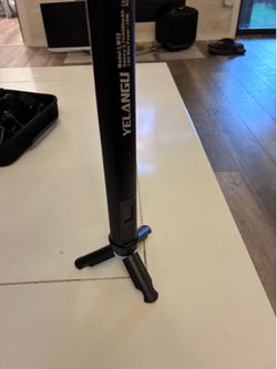 Light stick on small tripod