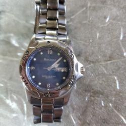 Armitron Men Watch Silver Stainless Steel 50m New Battery Day Date Quartz.