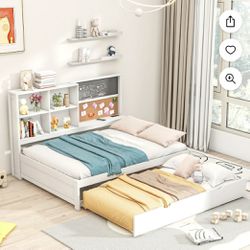Trundle bed with desk
