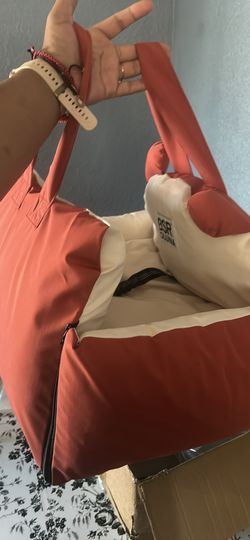 Dog car seat and also carrier with harness new was taken out of box to assemble