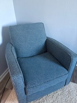 Blue and White Patterned Swivel Armchair