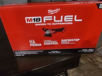 New Milwaukee M18 fuel cordless 4-1/2" 5" variable speed grinder w/5.0ah battery and charger