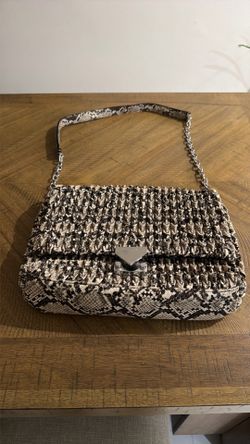 Armani Emporium snake purse.