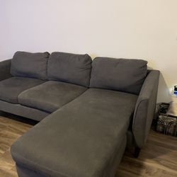 AYA GREY SOFA WITH REVERSIBLE CHAISE  Living spaces