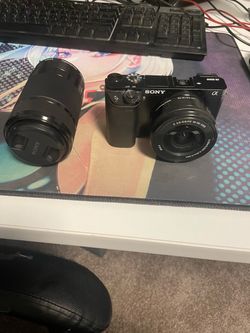 Sony A6000 mirrorless camera with additional lens