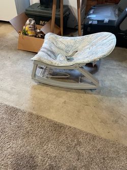 Boppy and baby rocker chair