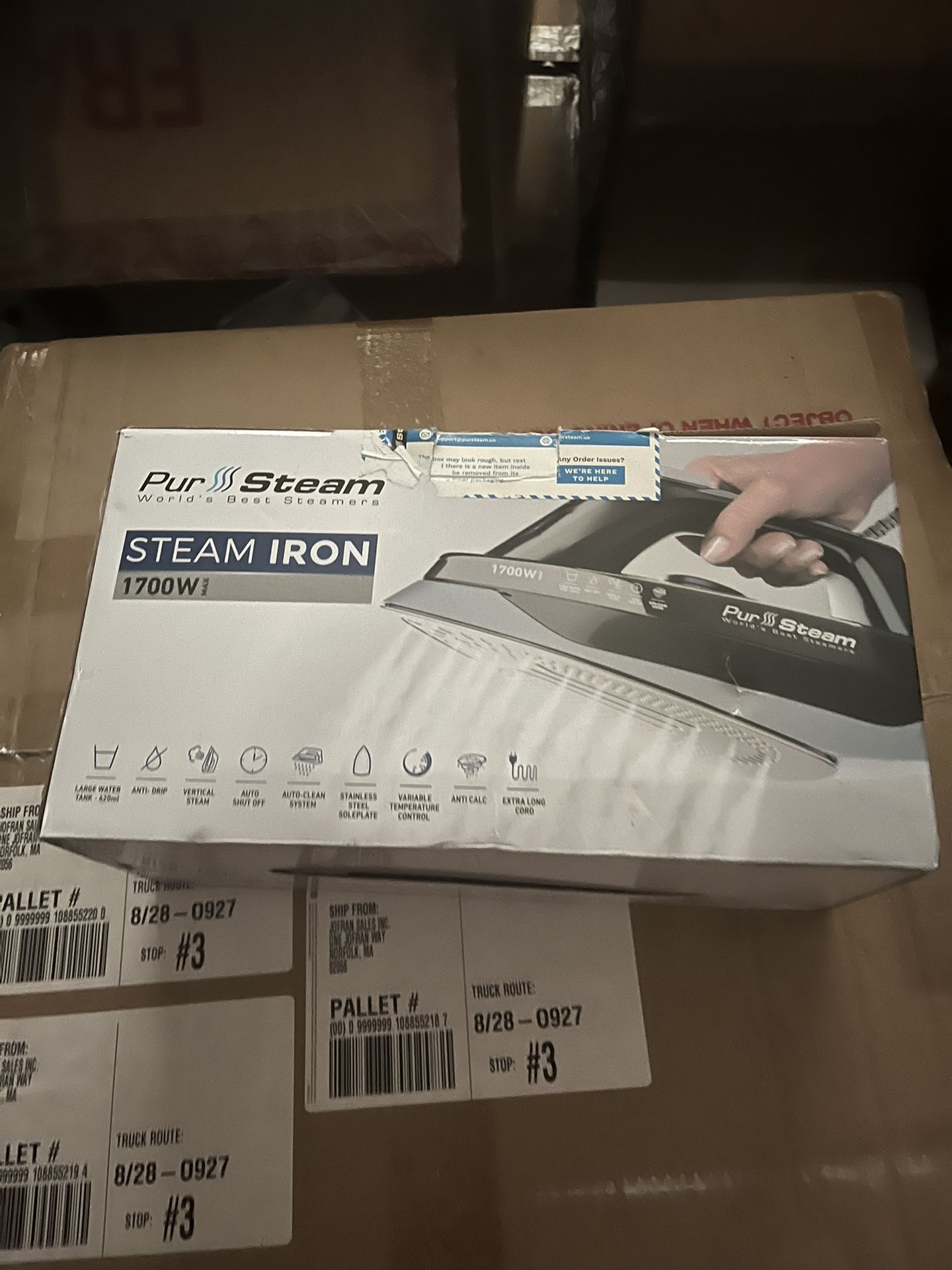 Iron inside the box of brand new