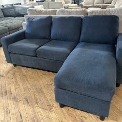 Delivery available blue sectional couch and chaise