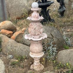 Koi fishes marble fountain