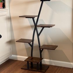 Six tiered metal and wood plant stand