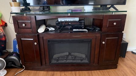 Entertainment center with electric fireplace