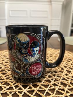 2023 universal studios Halloween horror nights never go alone mug.
