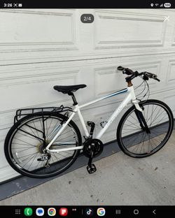 Giant Hybrid Size Medium Wheels 700cc Speeds 21 rear book rack front carbon fork light weight