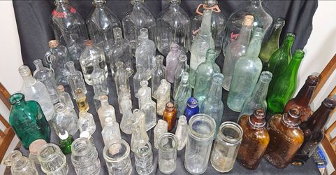 Large collection of very old bottles and jars