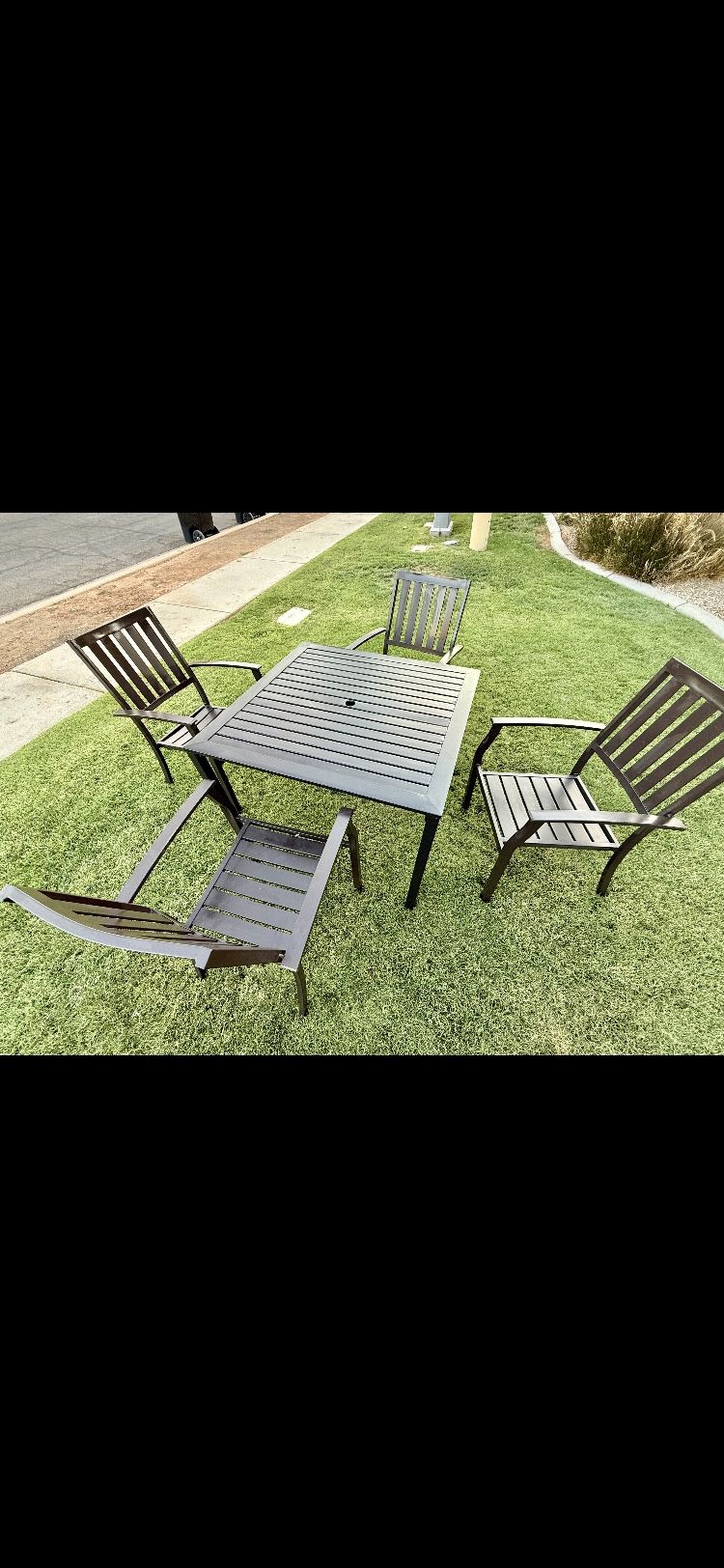 Beautiful nice quality Better Homes and Garden Patio Table and Four comfortable wide Chairs reduced to $190! (Originally $450)