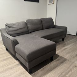 Grey Pull Out Couch (83.5” W X 53.5” D X 26” H)