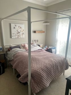 Full-size four poster bed with brand new mattress