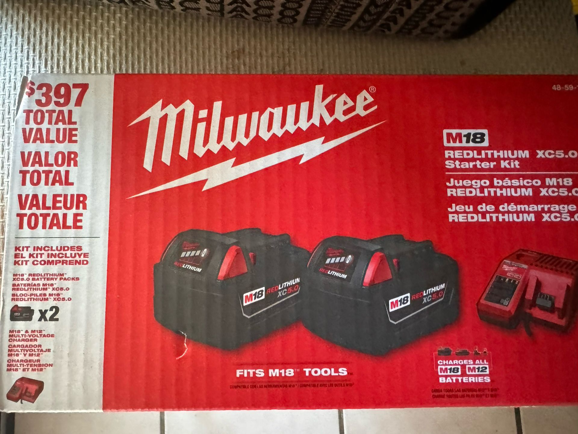 Milwaukee Set Of 2 Batteries And Charger