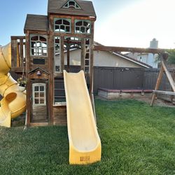 Outdoor Swing Sets with Two Sliders. 
