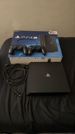 PS4 Pro 1TB – 2 Controllers + Original Box – Good Condition