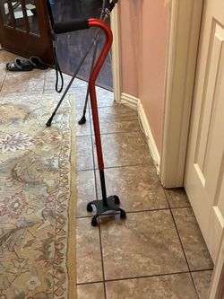 Red Aluminium quad Cane. 4 point base