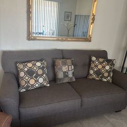 Sofa And Gold Mirror