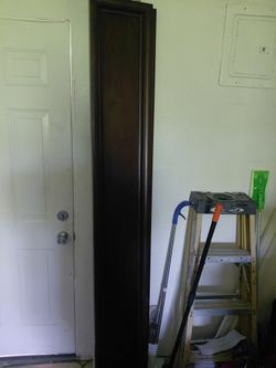 It's mahogany wood Cal l king bed frame Pristine condition