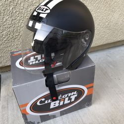 Two Motorcycle Helmets 