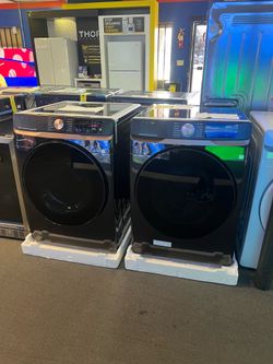 Samsung black front load washer and dryer