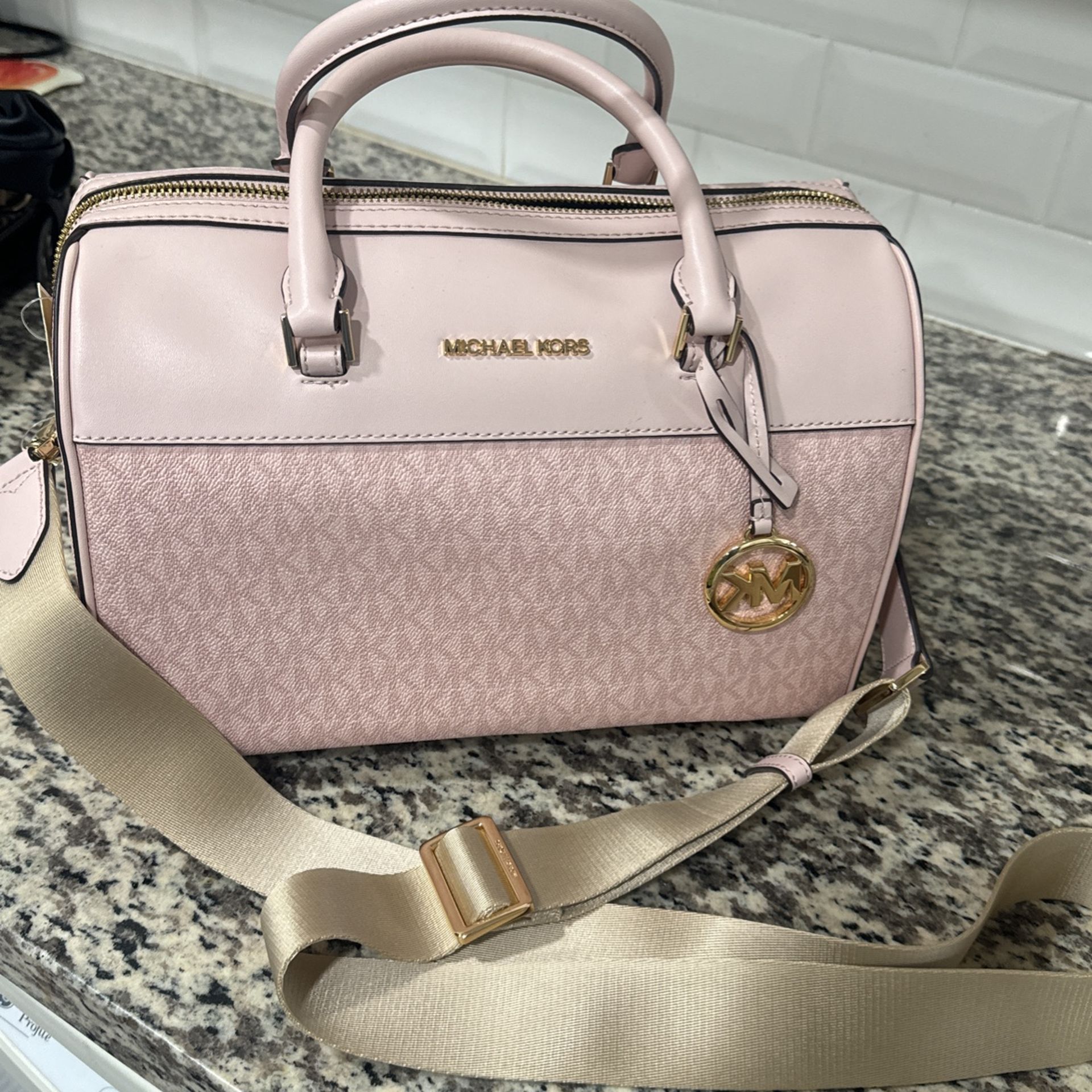 Bolsa? MICHAEL KORS la estoy dando por $190