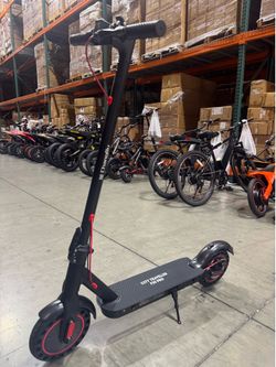 Electric scooter with shock absorption
