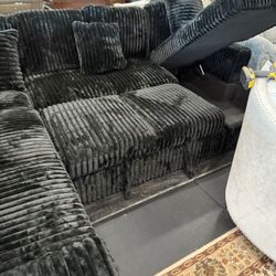 3 Piece Black Sectional With Pull Out Bed & Storage Chaise On Sale