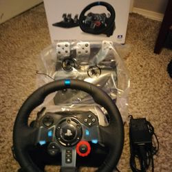 G 29 PlayStation simulation steering wheel pedals are brand new as they are compatible wheel is used normal wear