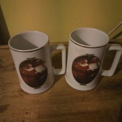 2  1996 collectible christmas cups