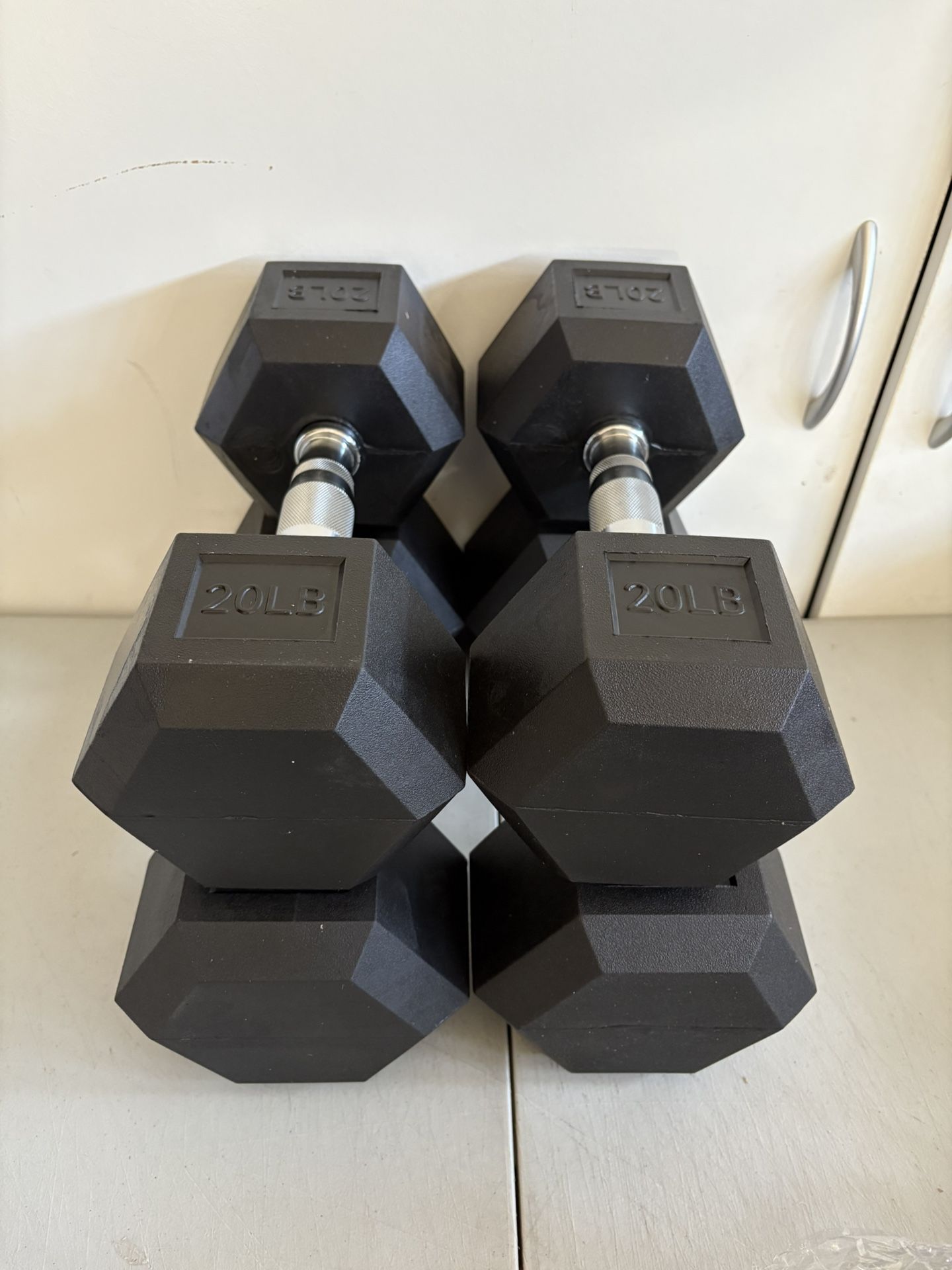 Brand New Set Of 20 & 25 Lb Dumbbells 