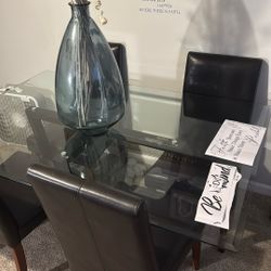 Glass Table And 4 High Back Chairs.  Pickup Only No Lowball. $250