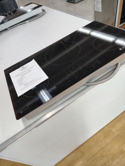 $1699 GE profile 36 in built in induction cooktop