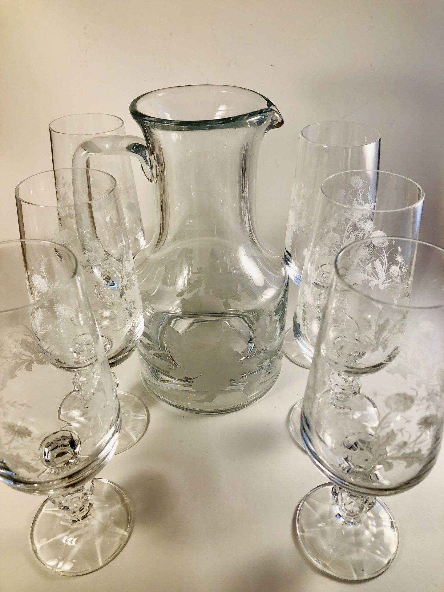 Antique Crystal Pitchter and Glasses.  White etched flowers on all, 7 Goblets 1 pitcher 