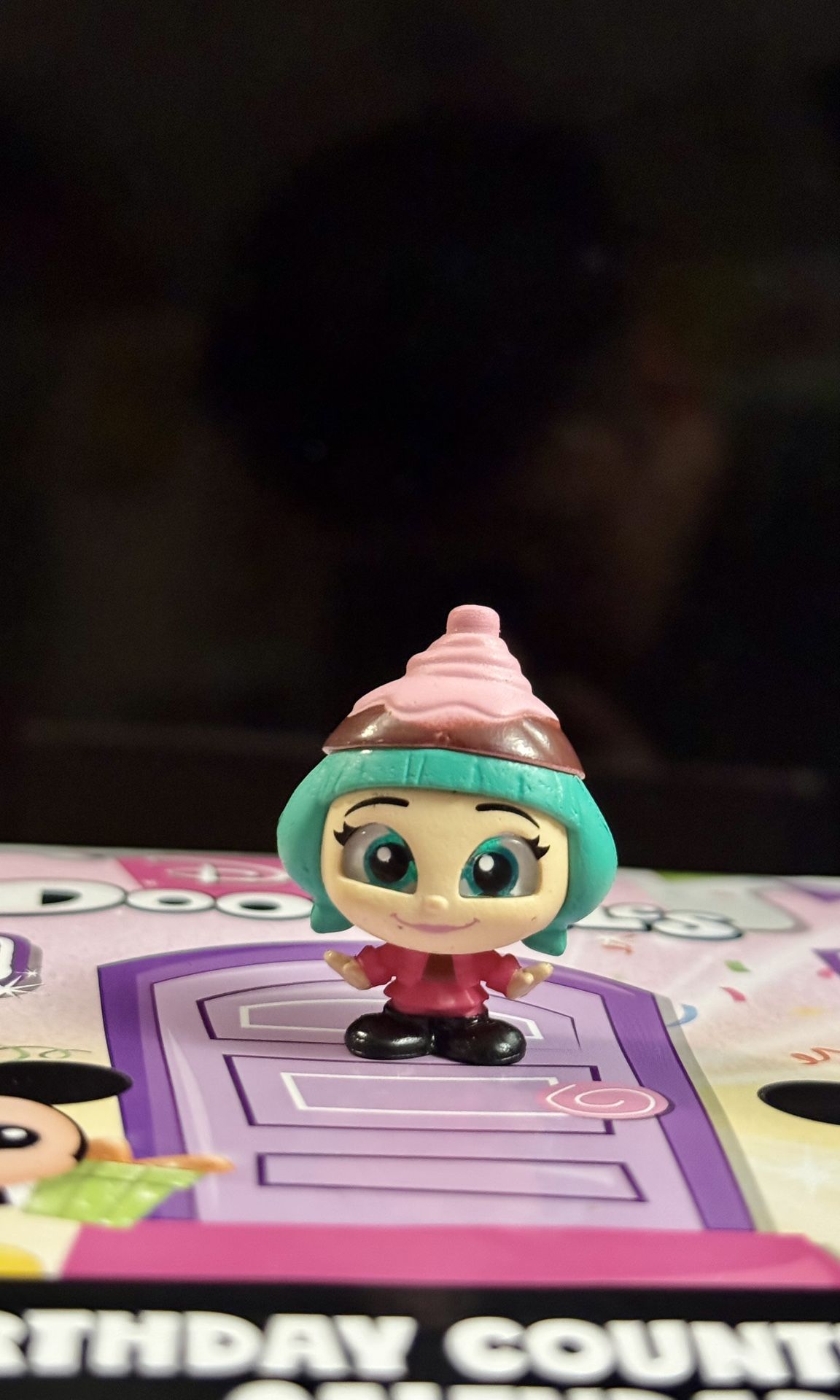 The Disney Doorables Figure - Candlehead from the Wreck It Ralph Common Series 8 is a collectible figurine that is part of the contemporary Disney fra