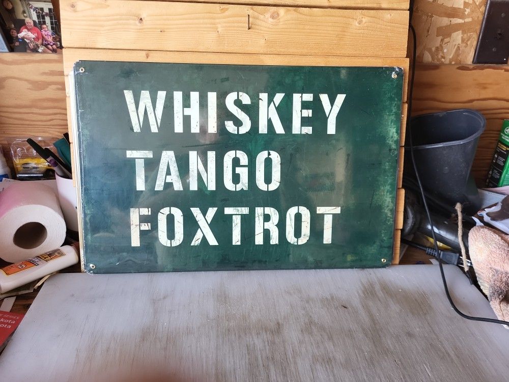 Whiskey Tango Foxtrot Metal Sign 12"x18"