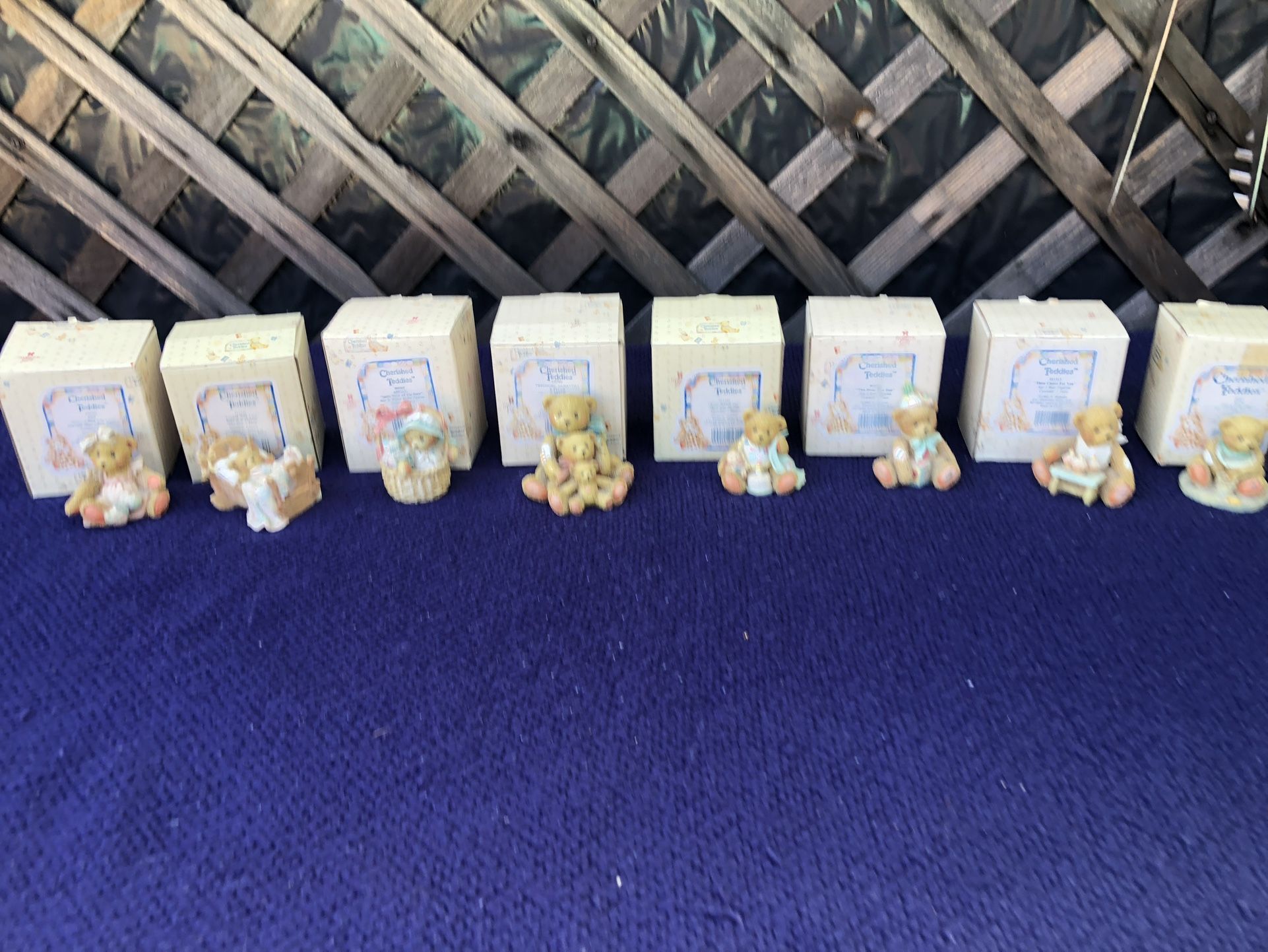 Cherished Teddies in original boxes.