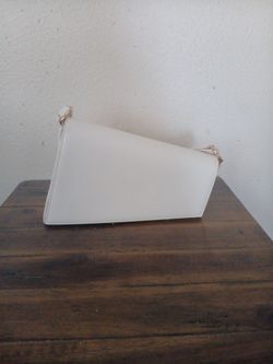 Asymmetrical cream coloured bag