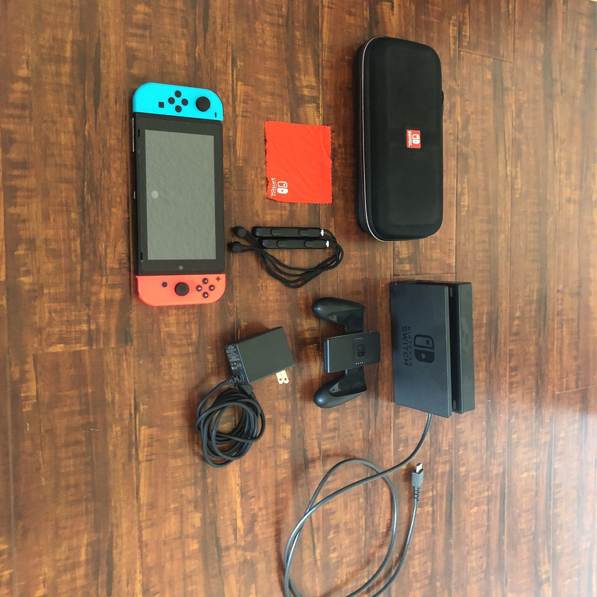 Nintendo Switch with carrier case and all cables