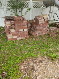 Three to four piles of bricks.