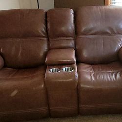 Like new Leather Reclining Love Seats