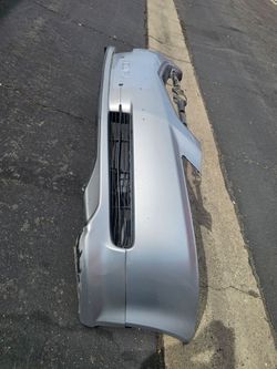 2004-2006 acura t.l front bumper with lower lip/ spoiler