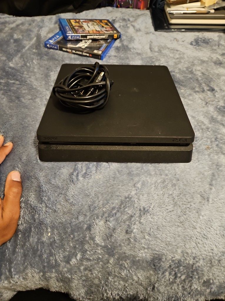 Slim Playstation 4 With PowerPoint,hdmi Cable, Gta 5(new), & Black Ops 6 (New)