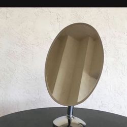 One Adjustable Stainless Steel Mirror With Heavy Base