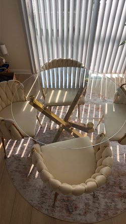 Gold/glass table and 4 chairs